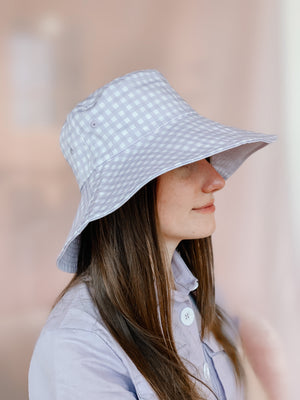 
            
                Load image into Gallery viewer, Reversible Bucket Hat - Gingham Lilac Bucket Hat
            
        